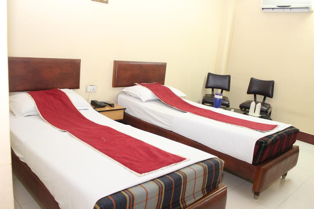 Hotel Bengal International Siliguri Quarto foto