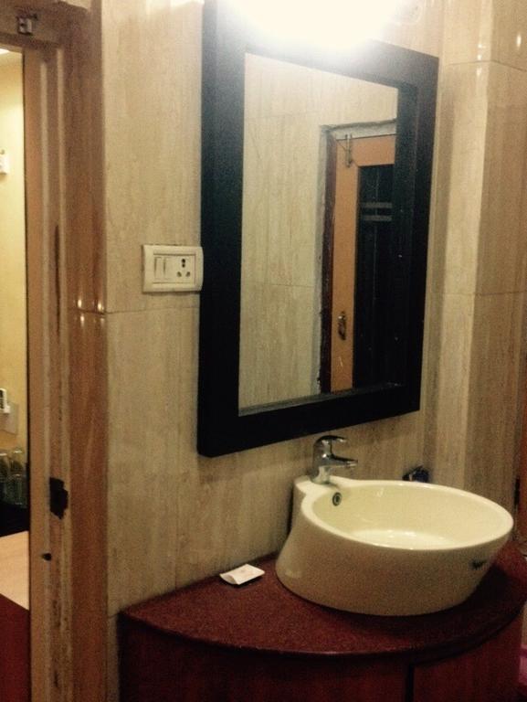 Hotel Bengal International Siliguri Quarto foto