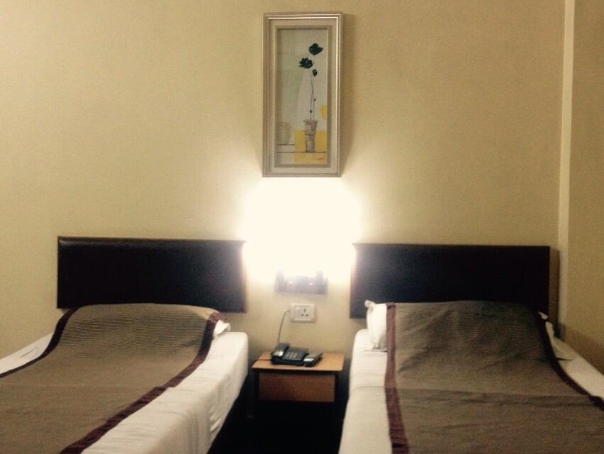 Hotel Bengal International Siliguri Quarto foto