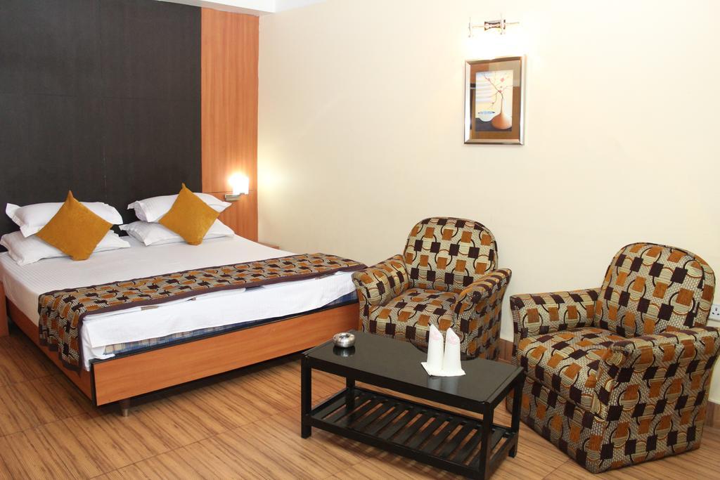 Hotel Bengal International Siliguri Quarto foto