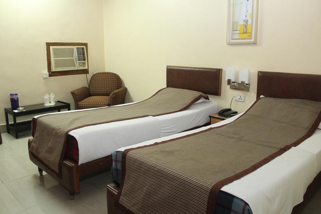 Hotel Bengal International Siliguri Quarto foto