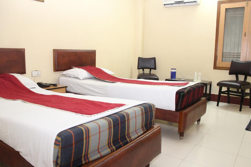 Hotel Bengal International Siliguri Quarto foto