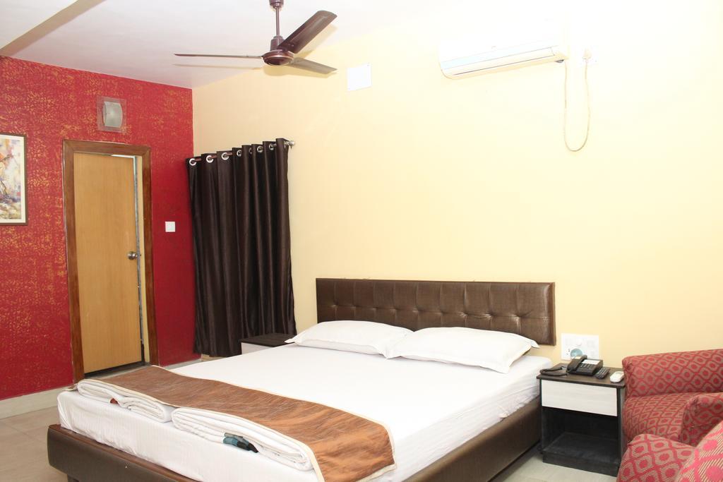 Hotel Bengal International Siliguri Quarto foto